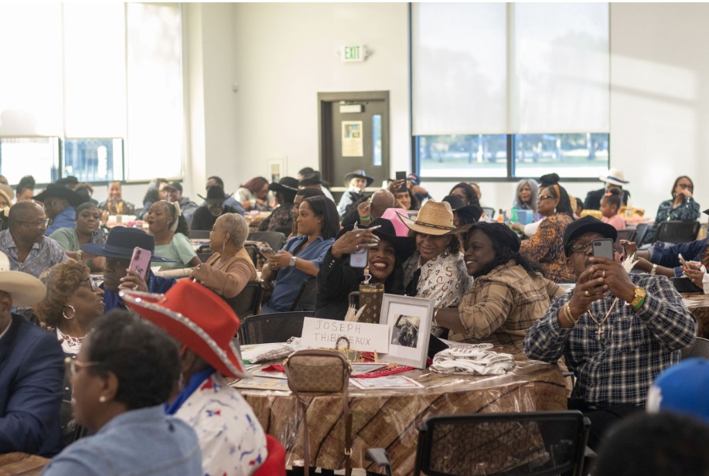 Guests celebrating at round tables during the awards banquet